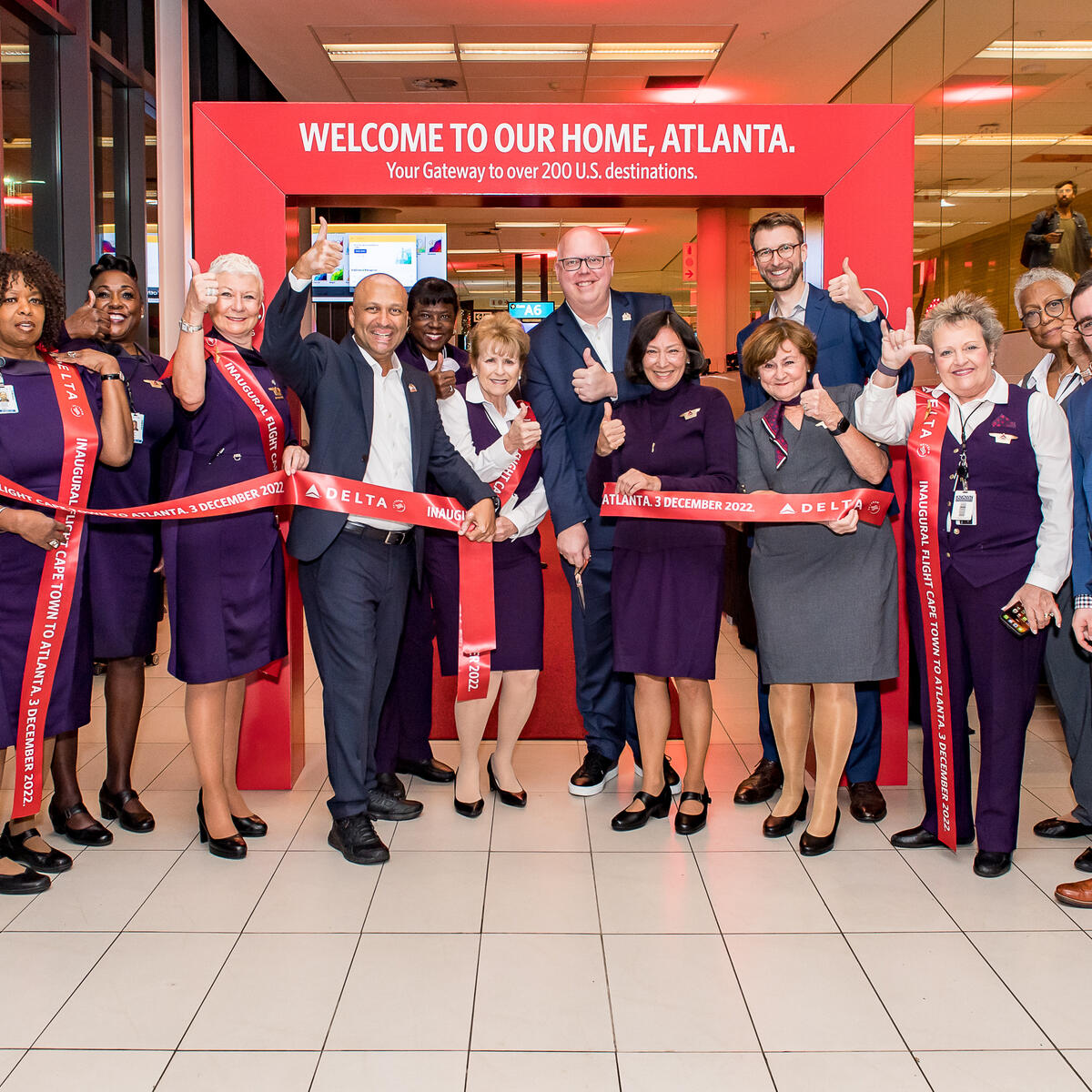 Delta people celebrate the airline's first flight from Cape Town, South Africa to Atlanta, Georgia, United States.