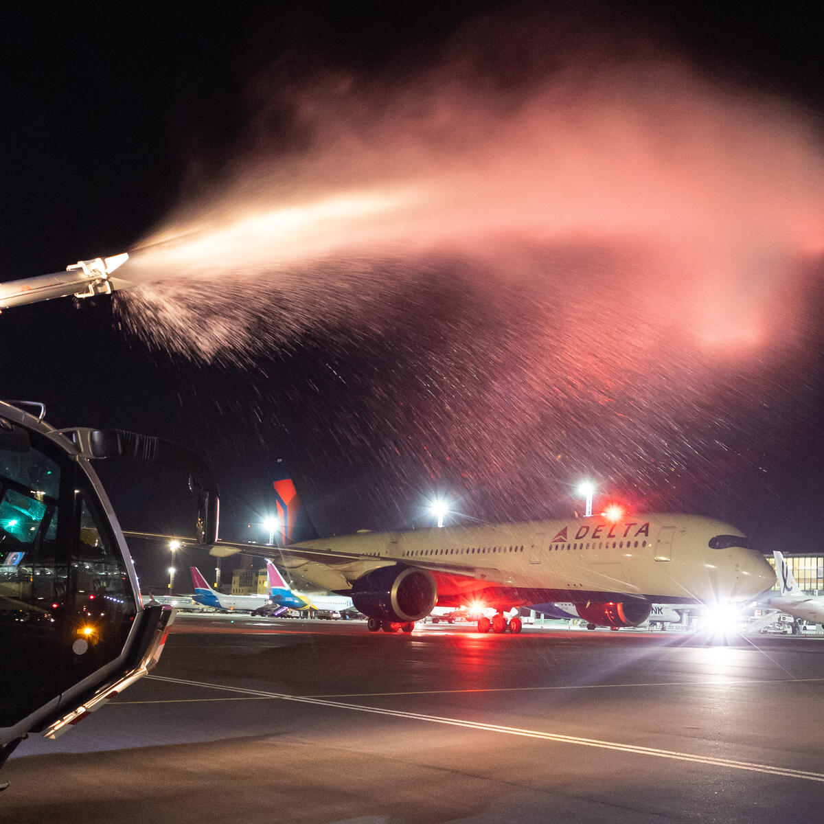 A Delta Air Lines Airbus A350 is welcomed with a water cannon salute upon arrival at Cape Town International Airport (CPT).