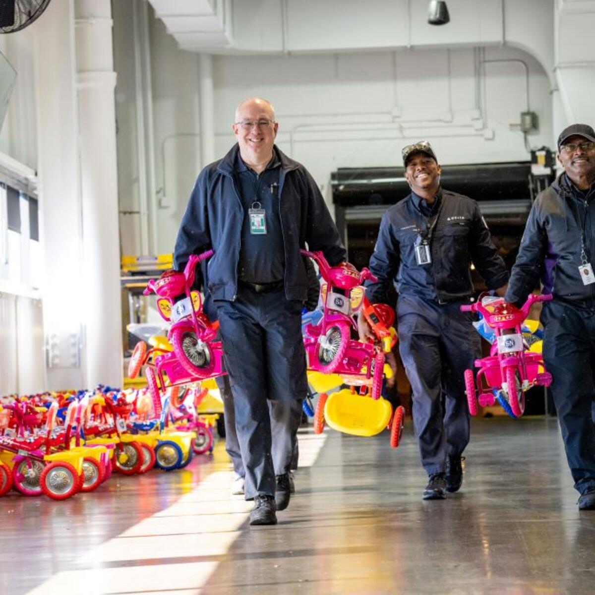 Delta people from TechOps, In-Flight Service, Global Sales, Finance, IT and Flight Operations rallied to purchase and assemble bicycles, as well as rally toy and money donations to support Toys for Tots.