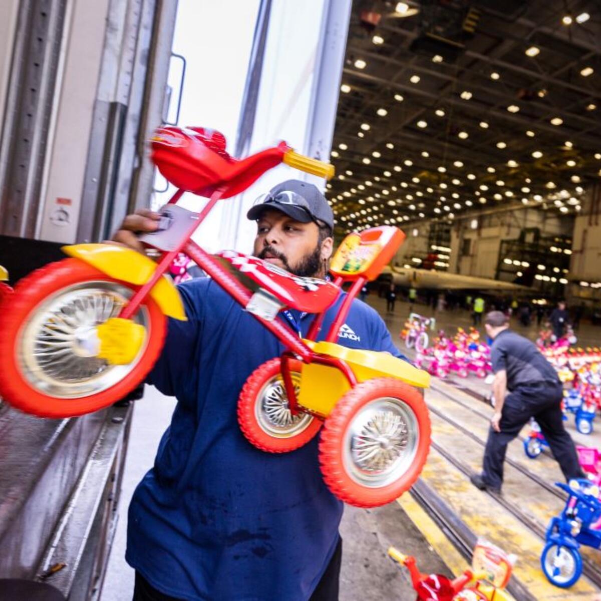 Delta people from TechOps, In-Flight Service, Global Sales, Finance, IT and Flight Operations rallied to purchase and assemble bicycles, as well as rally toy and money donations to support Toys for Tots.