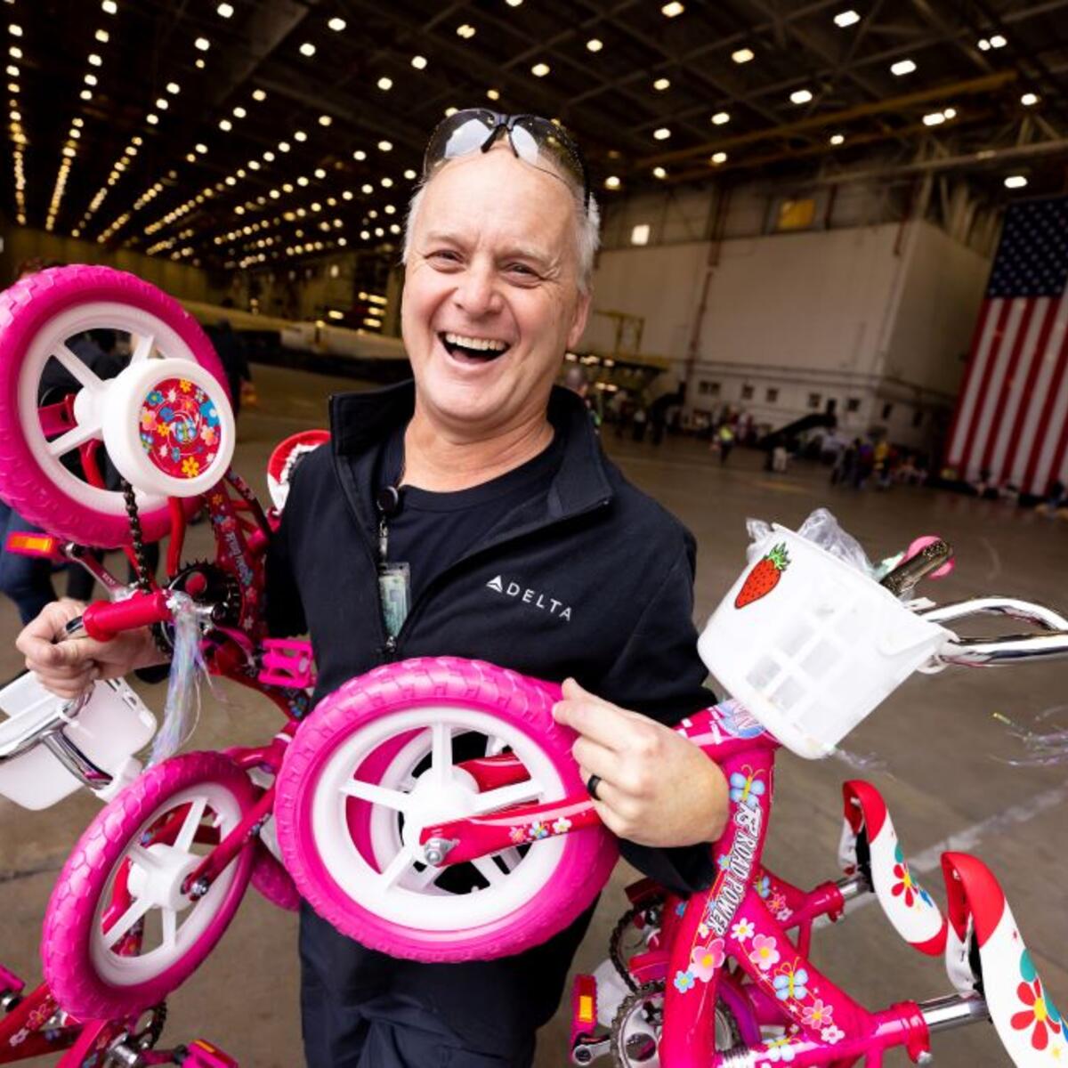 Delta people from TechOps, In-Flight Service, Global Sales, Finance, IT and Flight Operations rallied to purchase and assemble bicycles, as well as rally toy and money donations to support Toys for Tots.