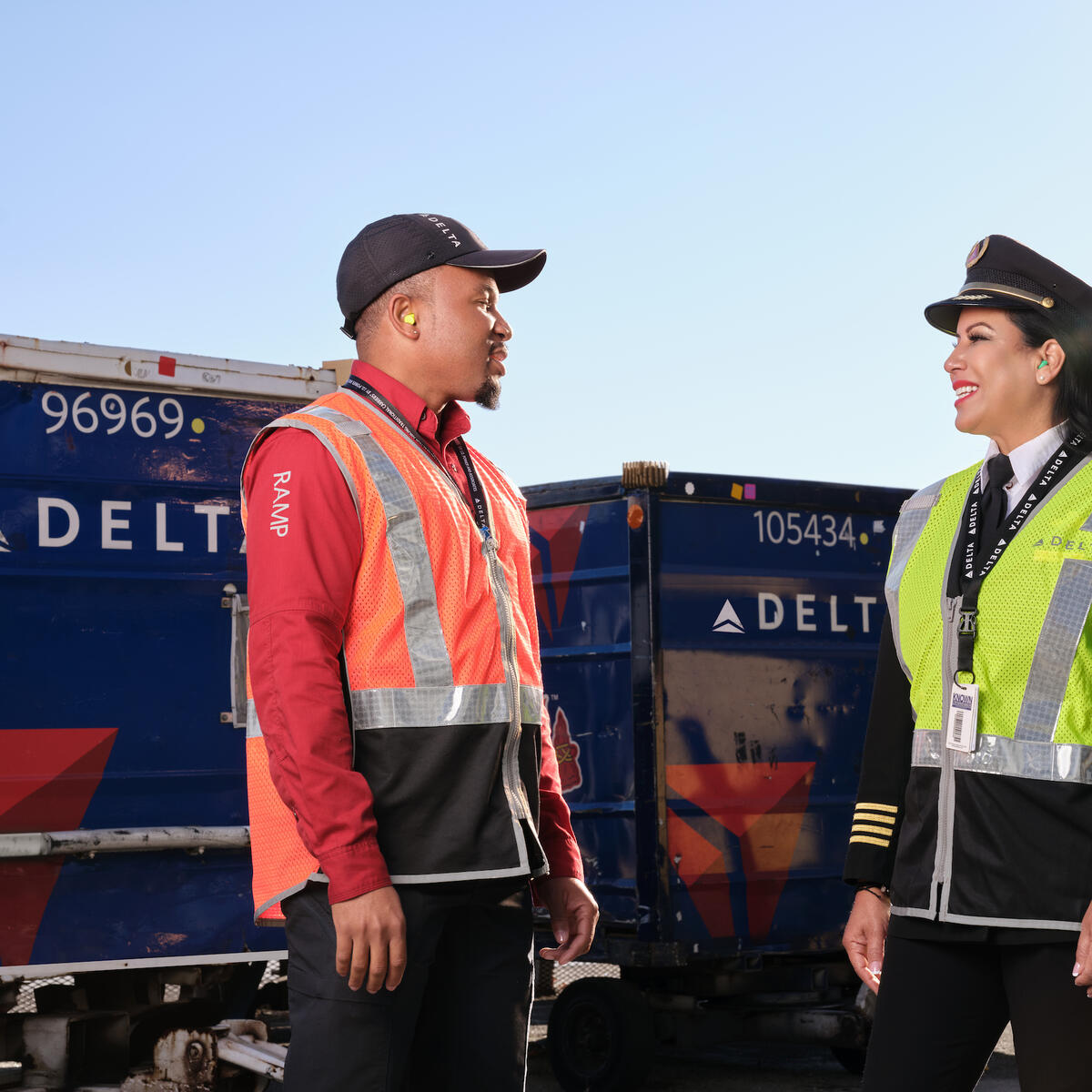 A Delta ramp agent and pilot talk at Hartsfield-Jackson Atlanta International Aiport.