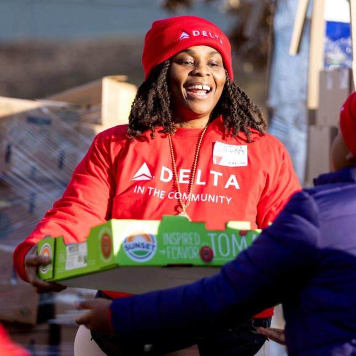 A Delta employee volunteers at Hosea Helps in Atlanta during the annual "Hosea Helps Festival of Services" event.