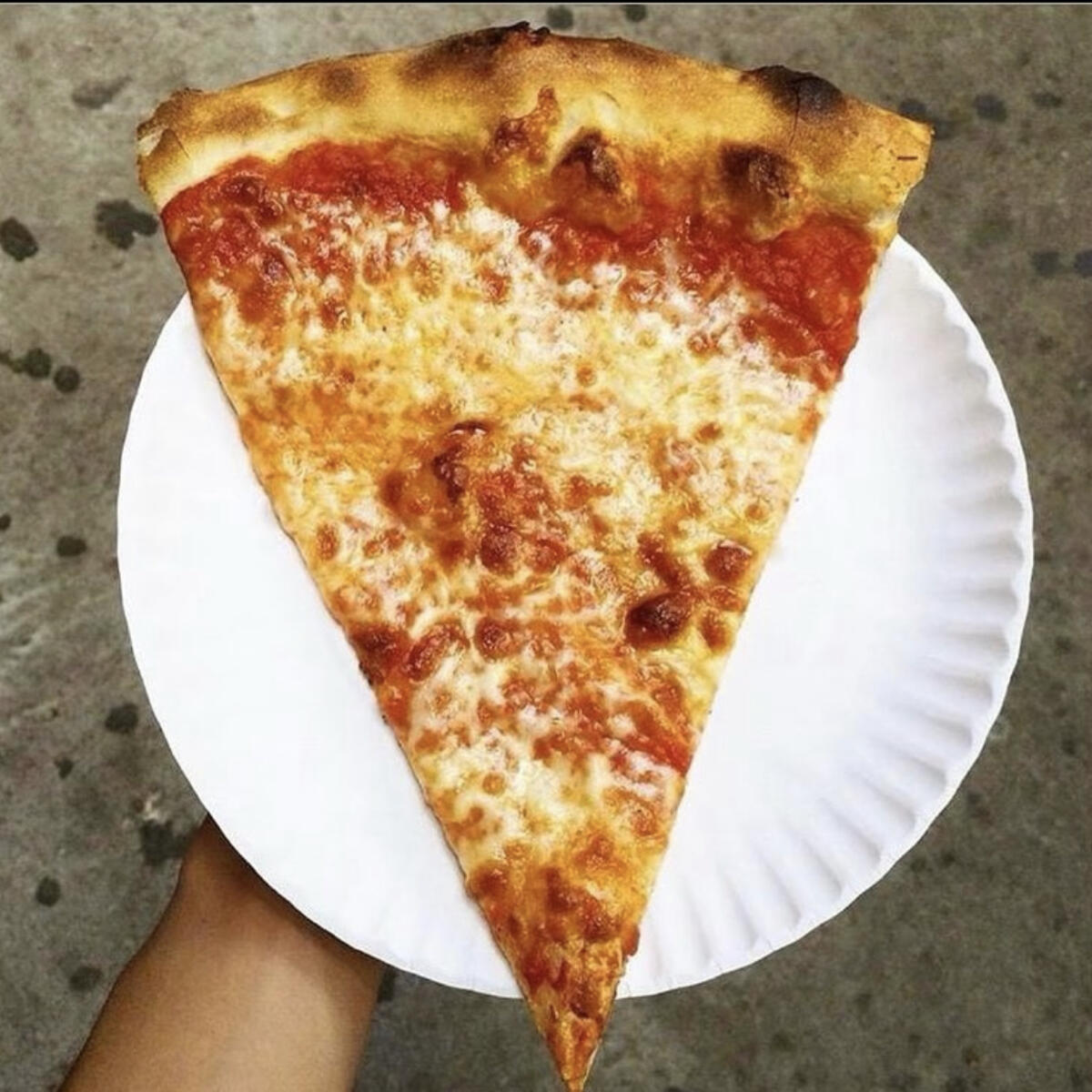 An authentic slice of NYC pizza.