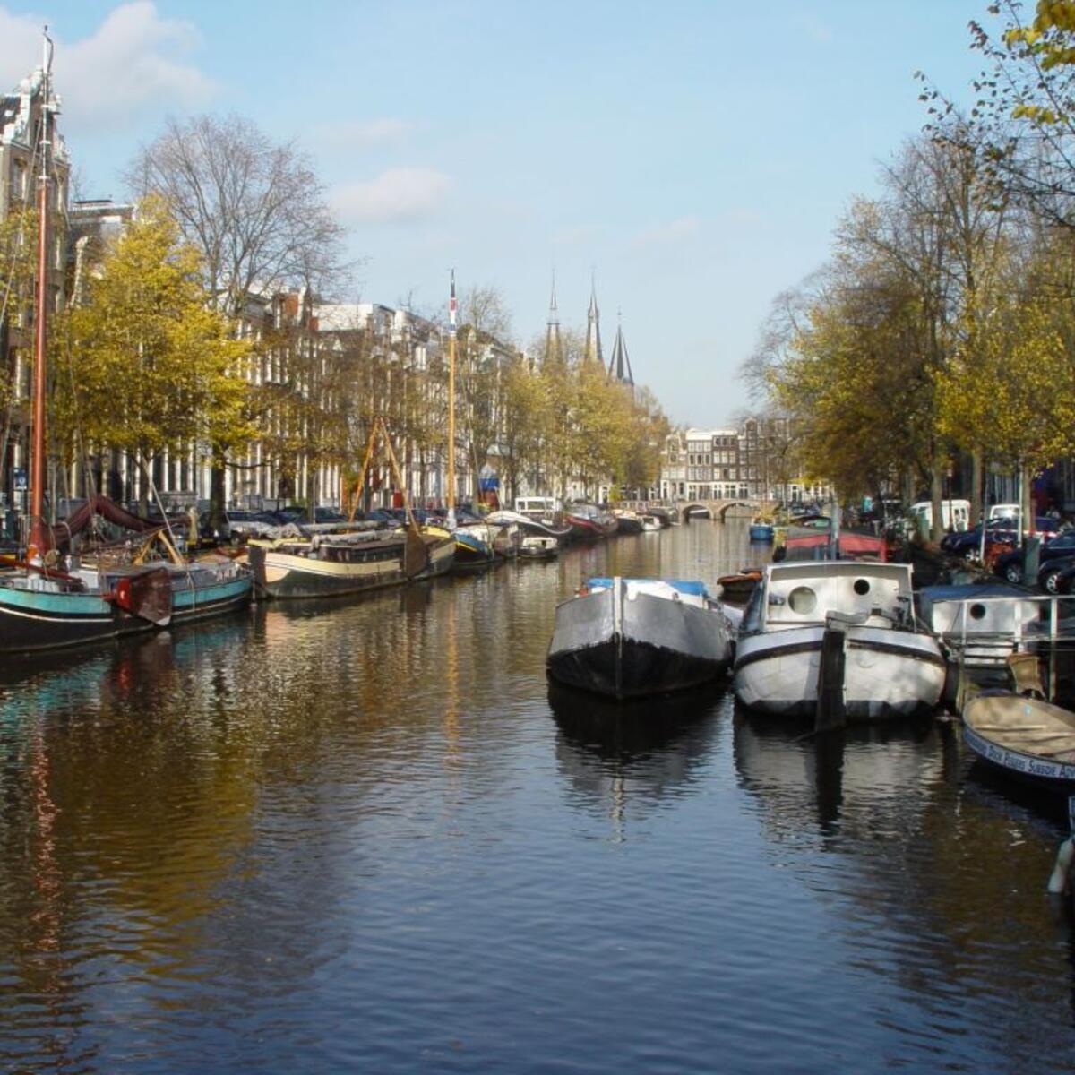 Boats and houses line one of Amsterdam's many canals.