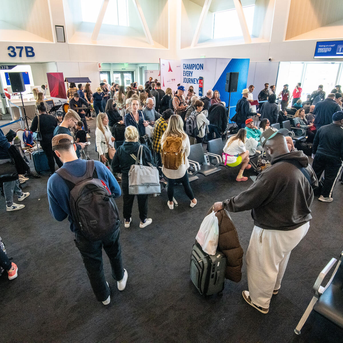Delta people, customers and friends celebrate the departure of Delta Flight 290 from Los Angeles International Airport (LAX) to Paris Charles de Gaulle Airport (CDG).