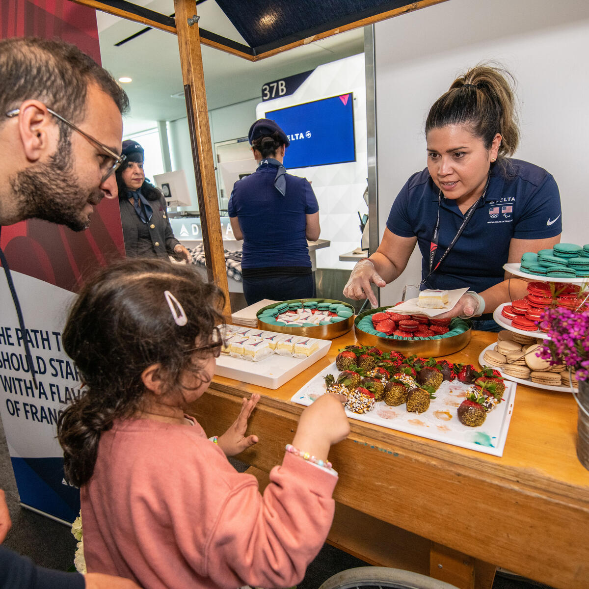 Delta people, customers and friends celebrate the departure of Delta Flight 290 from Los Angeles International Airport (LAX) to Paris Charles de Gaulle Airport (CDG).