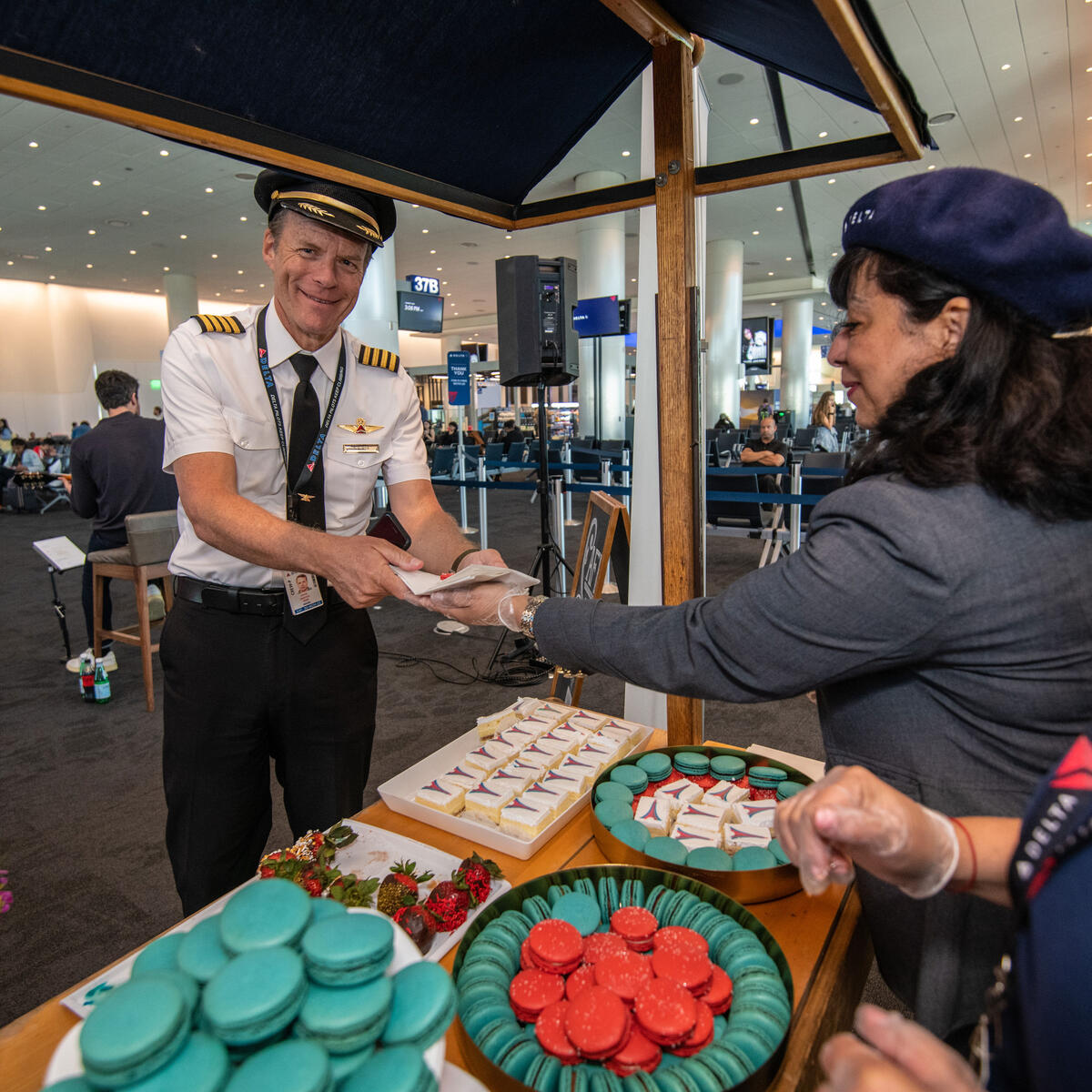 Delta people, customers and friends celebrate the departure of Delta Flight 290 from Los Angeles International Airport (LAX) to Paris Charles de Gaulle Airport (CDG).