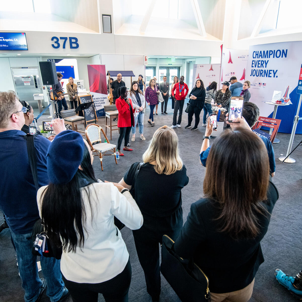 Delta people, customers and friends celebrate the departure of Delta Flight 290 from Los Angeles International Airport (LAX) to Paris Charles de Gaulle Airport (CDG).