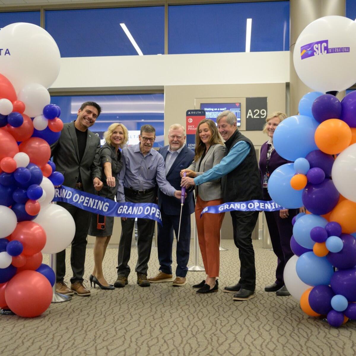 Officials participate in a ribbon-cutting ceremony at SLC on May 16, 2023. Delta’s growth continues at Salt Lake City International Airport with the opening of five additional gates this week, following the initial launch of a new 900,000-square-foot Concourse A in Sept. 2020.