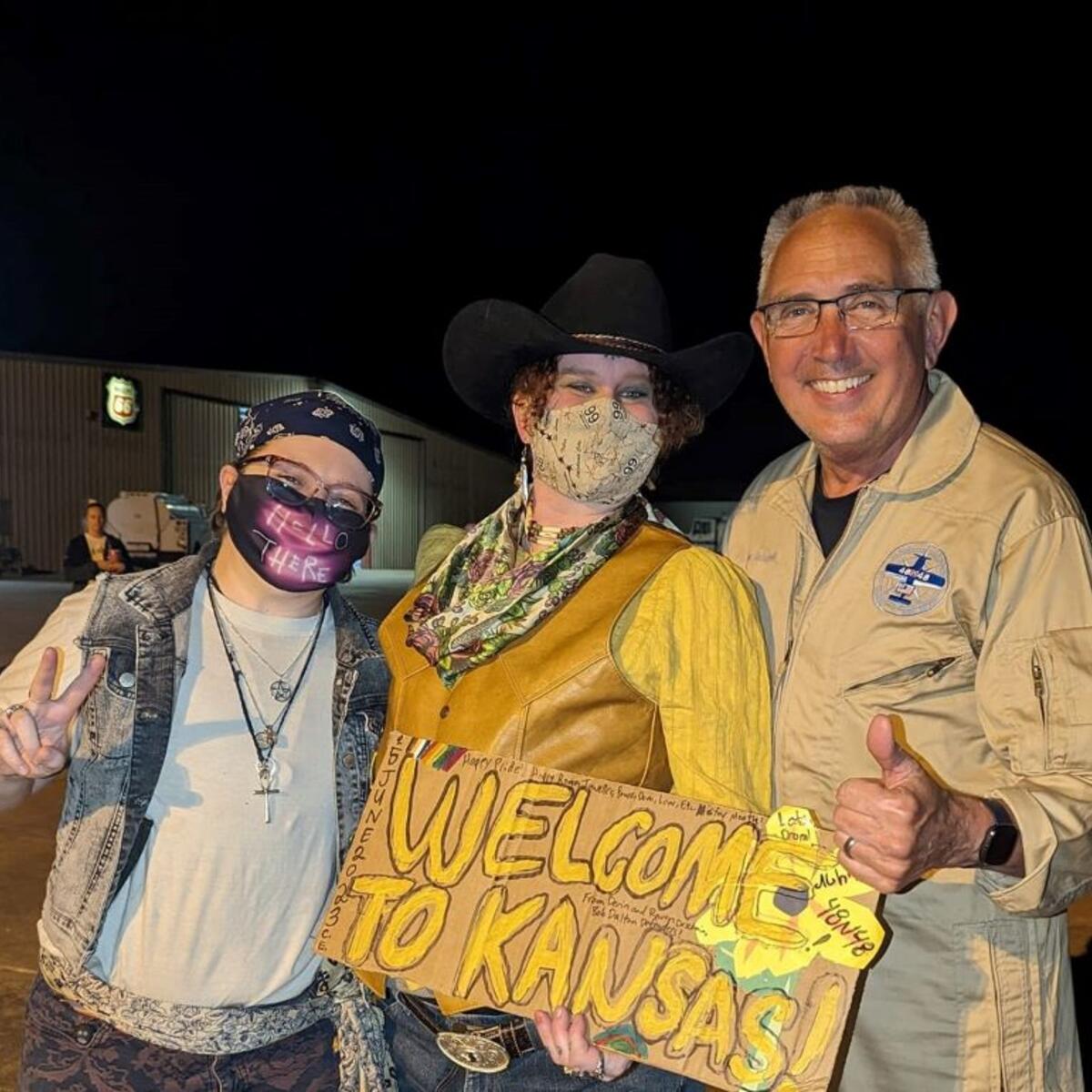 Delta pilot Barry Behnfeldt greets fans in Coffeyville, Kansas during his Guinness World Record attempt at flying through 48 states in 48 hours.