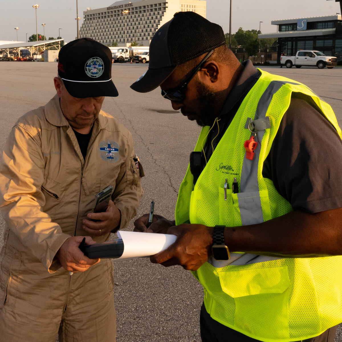 Pilots Barry Behnfeldt and Aaron Wilson, along with maintenance technician Thomas Twiddy make a stop at Hartsfield-Jackson Atlanta International Airport (ATL) during their 48N48 mission -- an attempt to land in all 48 of the contiguous states within 48 hours. They were greeted by Delta Chief of Operations John Laughter.