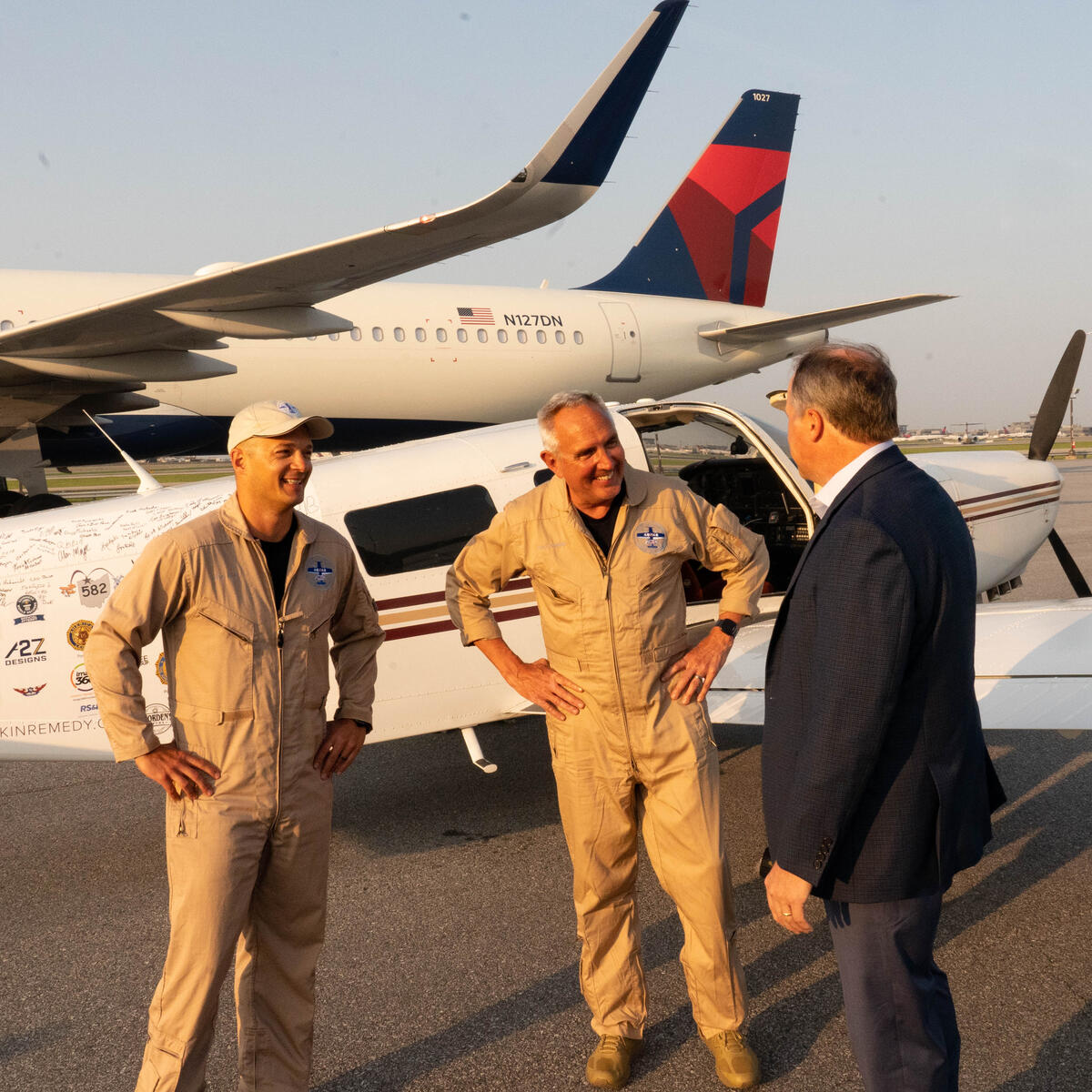 Pilots Barry Behnfeldt and Aaron Wilson, along with maintenance technician Thomas Twiddy make a stop at Hartsfield-Jackson Atlanta International Airport (ATL) during their 48N48 mission -- an attempt to land in all 48 of the contiguous states within 48 hours. They were greeted by Delta Chief of Operations John Laughter.