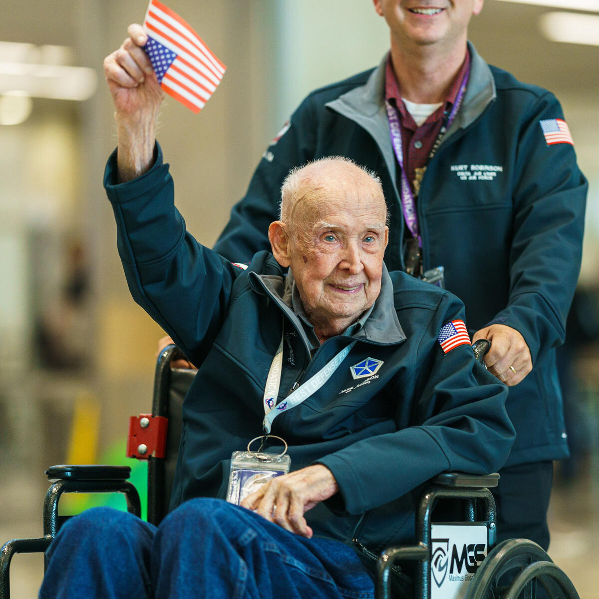 WWII veterans are greeted at the Hartsfield-Jackson Atlanta International Airport before boarding a flight to Normandy, France for the 79th annual commemoration of the 1944 D-Day invasion.  