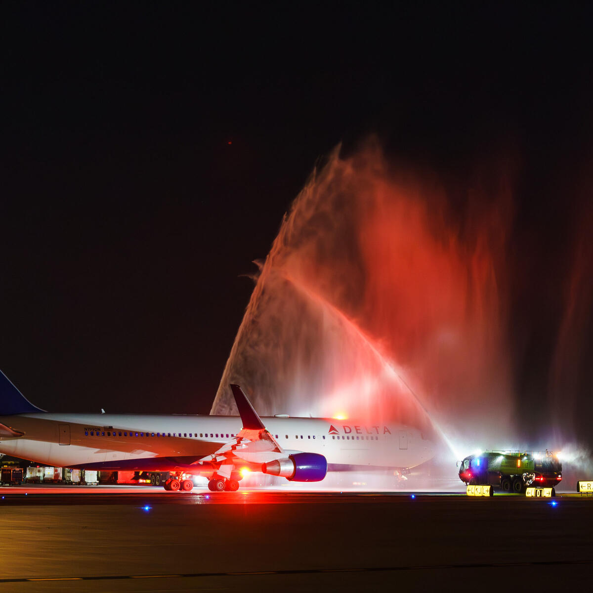 A water cannon salute honors World War II veterans on their journey to Normandy to commemorate the 79th anniversary of the D-Day invasion.
