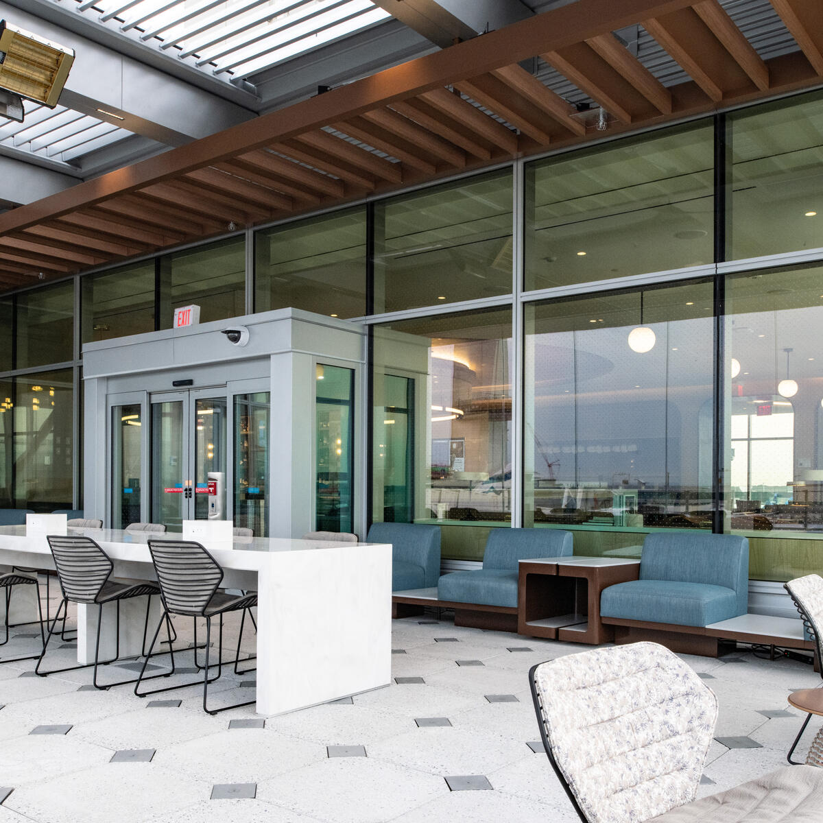 The nearly 14,000-square-foot Delta Sky Club at New York - JFK seats more than 250 guests and includes a covered Sky Deck.