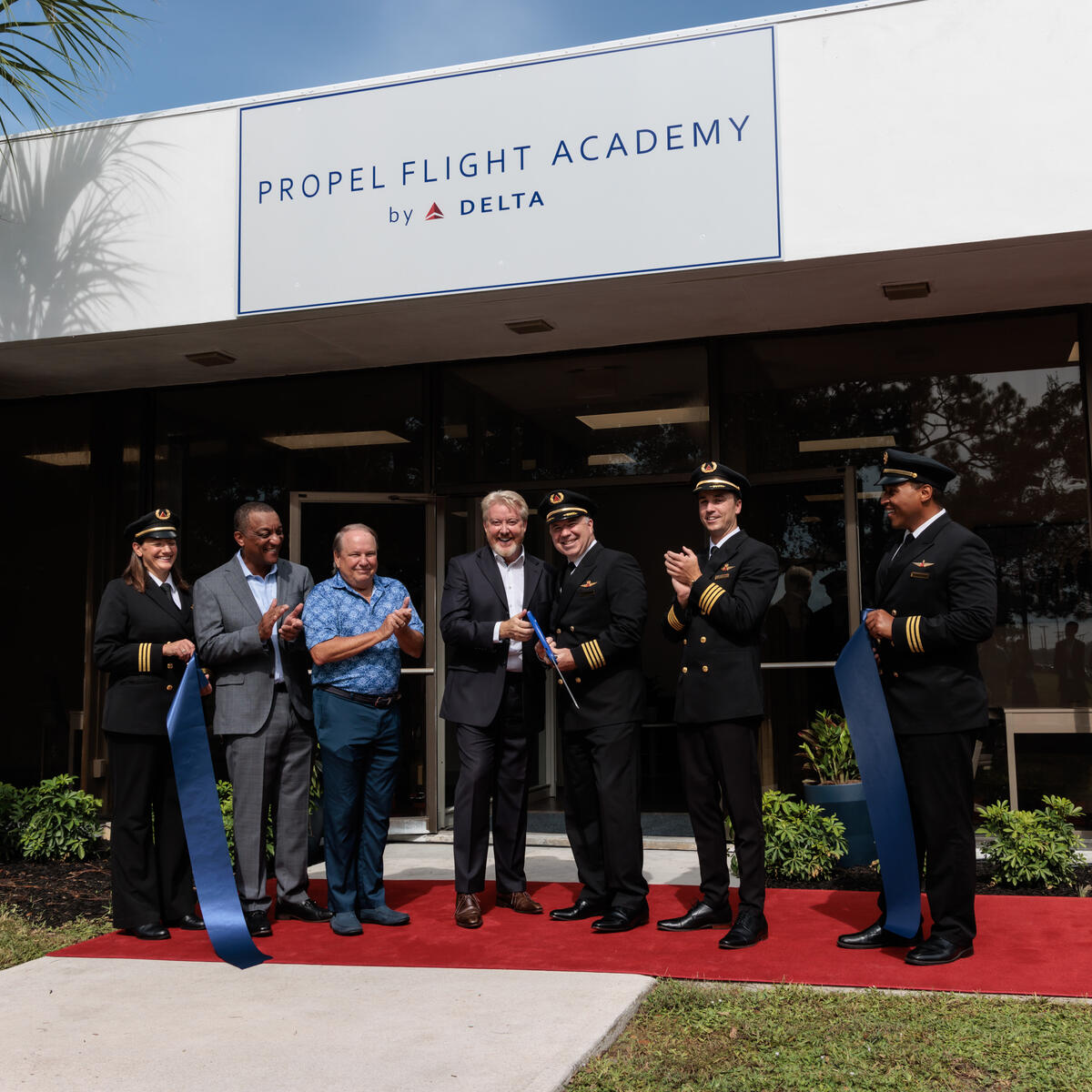 A ribbon cutting at the event to celebrate the official opening of Delta's Propel Flight Academy.