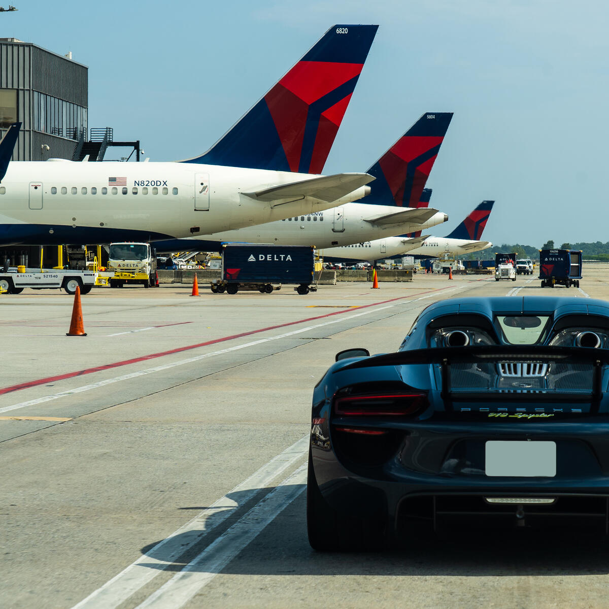 A Porsche 918 Spyder carries a Delta customer to a connecting flight at Hartsfield-Jackson Atlanta International Airport.