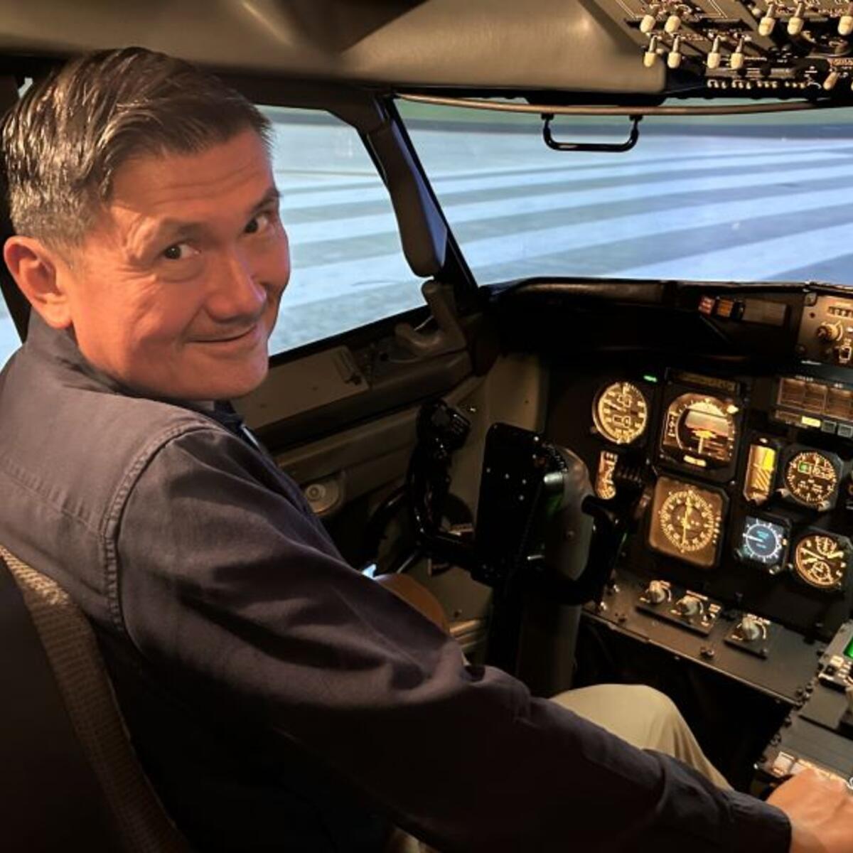 After a few fun trips in the Boeing 737-200 flight simulator, Todd O., Delta's most frequent flyer, prefers to fly in Delta One than a pilot seat. 