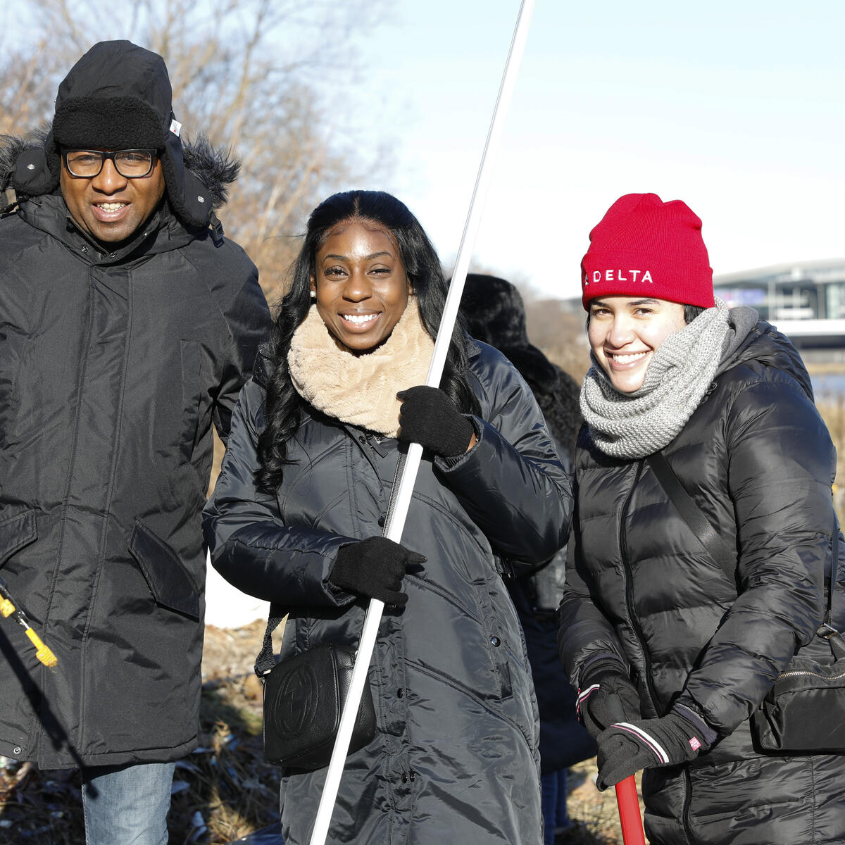 Queens Borough President Donovan Richards joins Delta people in clean up event at Flushing Meadows Park on MLK Day.