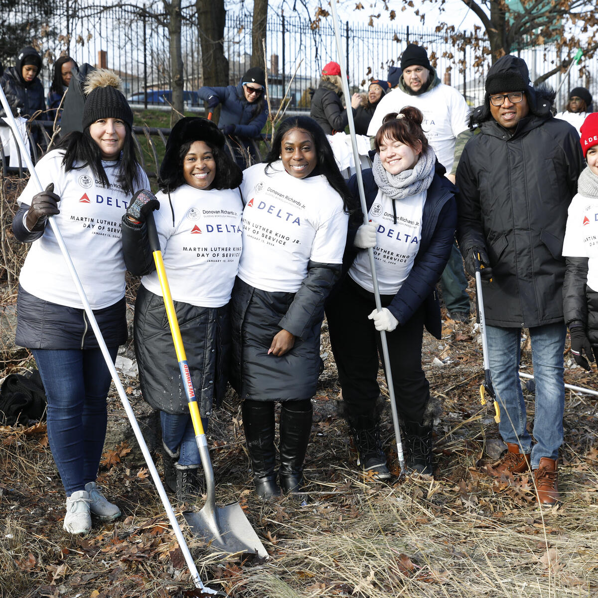 Queens Borough President Donovan Richards joins Delta people in clean up event at Flushing Meadows Park on MLK Day.