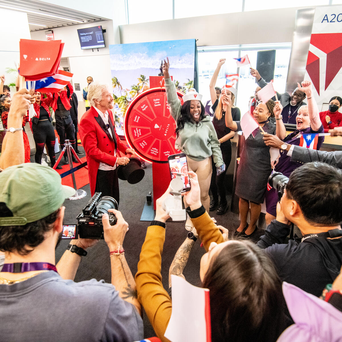 Virgin Voyages, the multi award-winning travel brand that was voted No. 1 in Condé Nast Traveler’s 2023 Readers’ Choice Awards, delighted customers on a recent Delta flight when Sir Richard Branson surprised them with a cruise vacation aboard his newest ship, Resilient Lady.