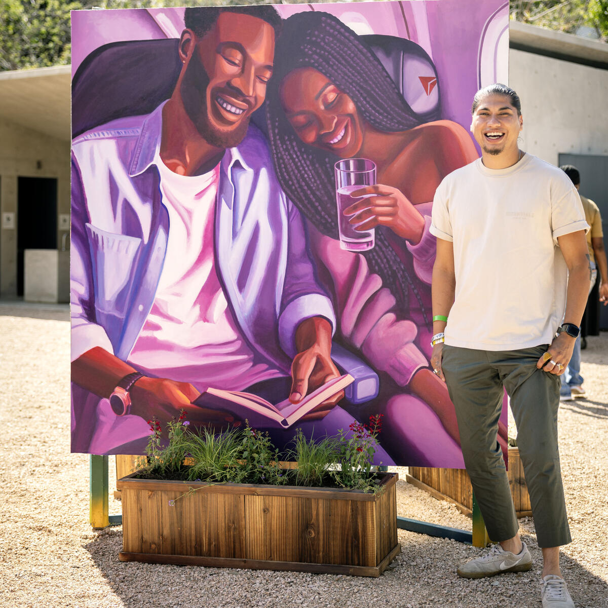 Delta, in partnership with Waterloo Greenway and Future Front Texas, demonstrated its commitment in Austin with the unveiling of a new mural, co-designed by the airline and local artists Ruben Esquivel of East End Eclectic and Kat Talley. Ruben poses next to the mural, which reflects a human-centric, connected vision for the future of the Austin community.