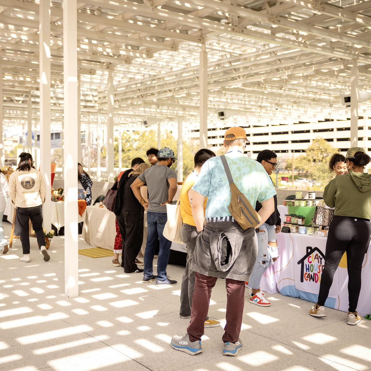 Visitors buzz through the Waterloo Community Market&nbsp;pop-up market featuring more than 20 local artists and entrepreneurs on Sunday, March 10, at Meredith Heritage Tree Deck in Waterloo Park. Delta partnered with&nbsp;Waterloo Greenway and Future Front Texas to host the event.