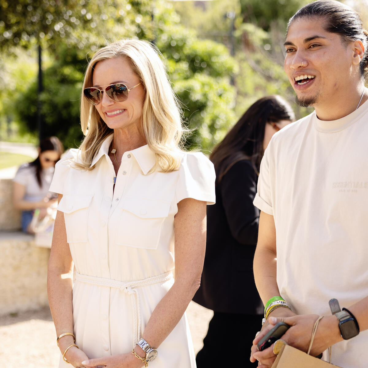Delta Air Lines CMO Alicia Tillman and Ruben Esquivel, local Austin-based muralist (East End Eclectic) view&nbsp;the Waterloo Greenway activation during the SXSW 2024 festivities.