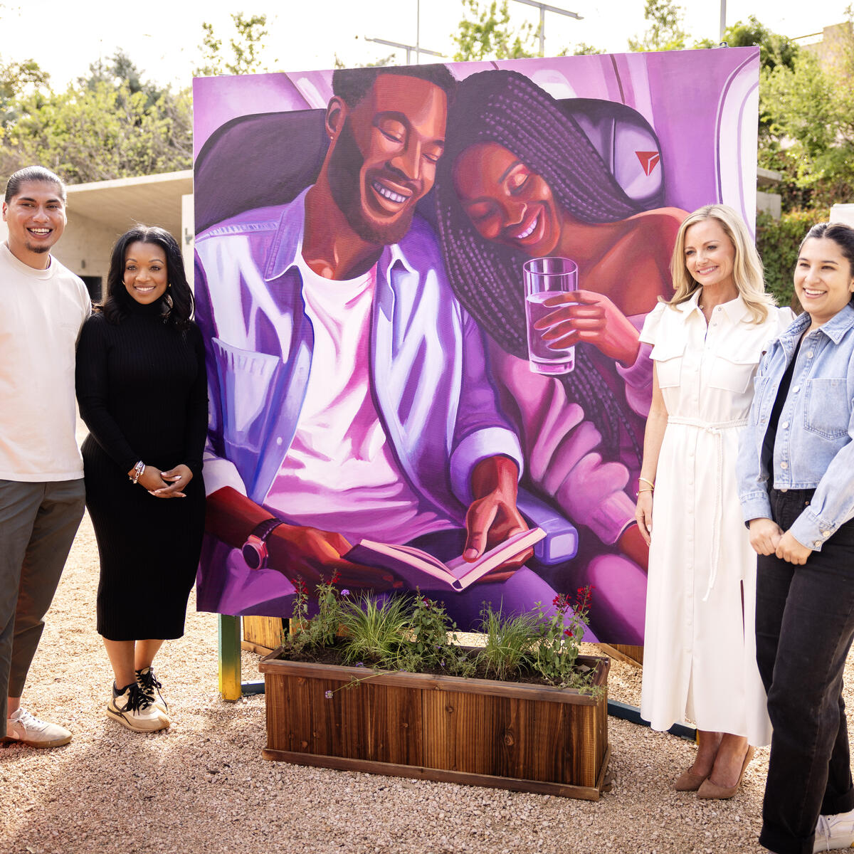 Austin artists Ruben Esquivel and Kat Talley with Quinnie Jenkins, Director, Community Engagement and Alicia Tillman, Chief Marketing Officer, at Delta's&nbsp;unveiling of a new mural, co-designed by the airline and local artists.