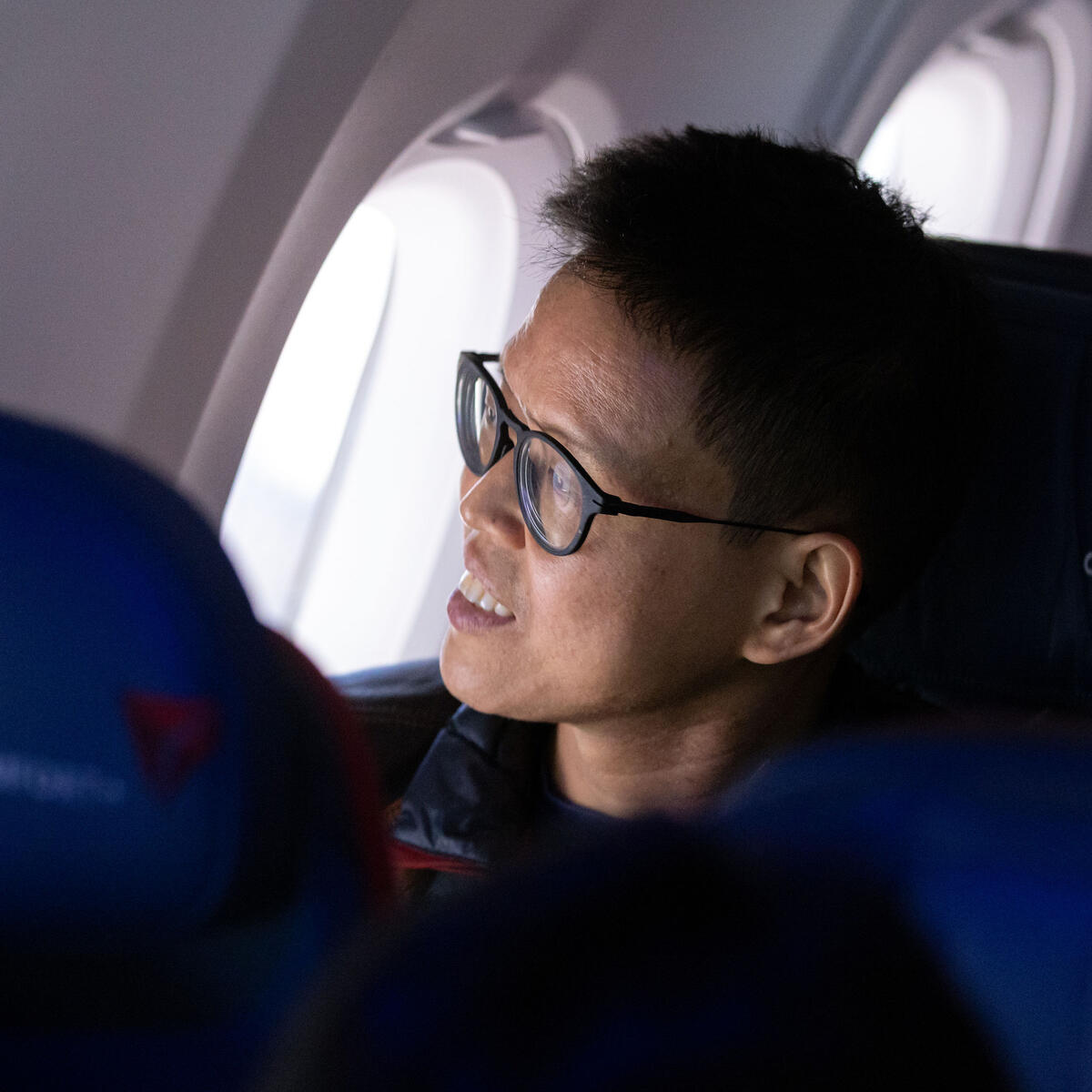 Customers on board DL 1010 from Dallas Fort Worth International Airport (DTW) to Detroit Wayne County Metropolitan Airport (DFW) view the solar eclipse.