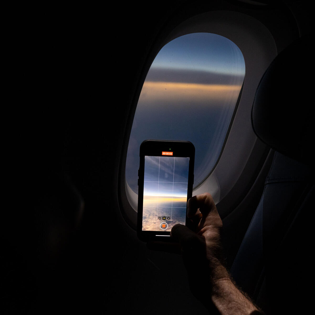 Customers on board DL 1010 from Dallas Fort Worth International Airport (DTW) to Detroit Wayne County Metropolitan Airport (DFW) view the solar eclipse.
