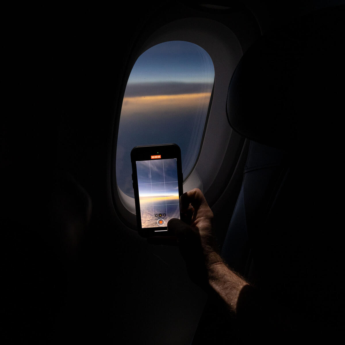 Customers on board DL 1010 from Dallas Fort Worth International Airport (DTW) to Detroit Wayne County Metropolitan Airport (DFW) view the solar eclipse.