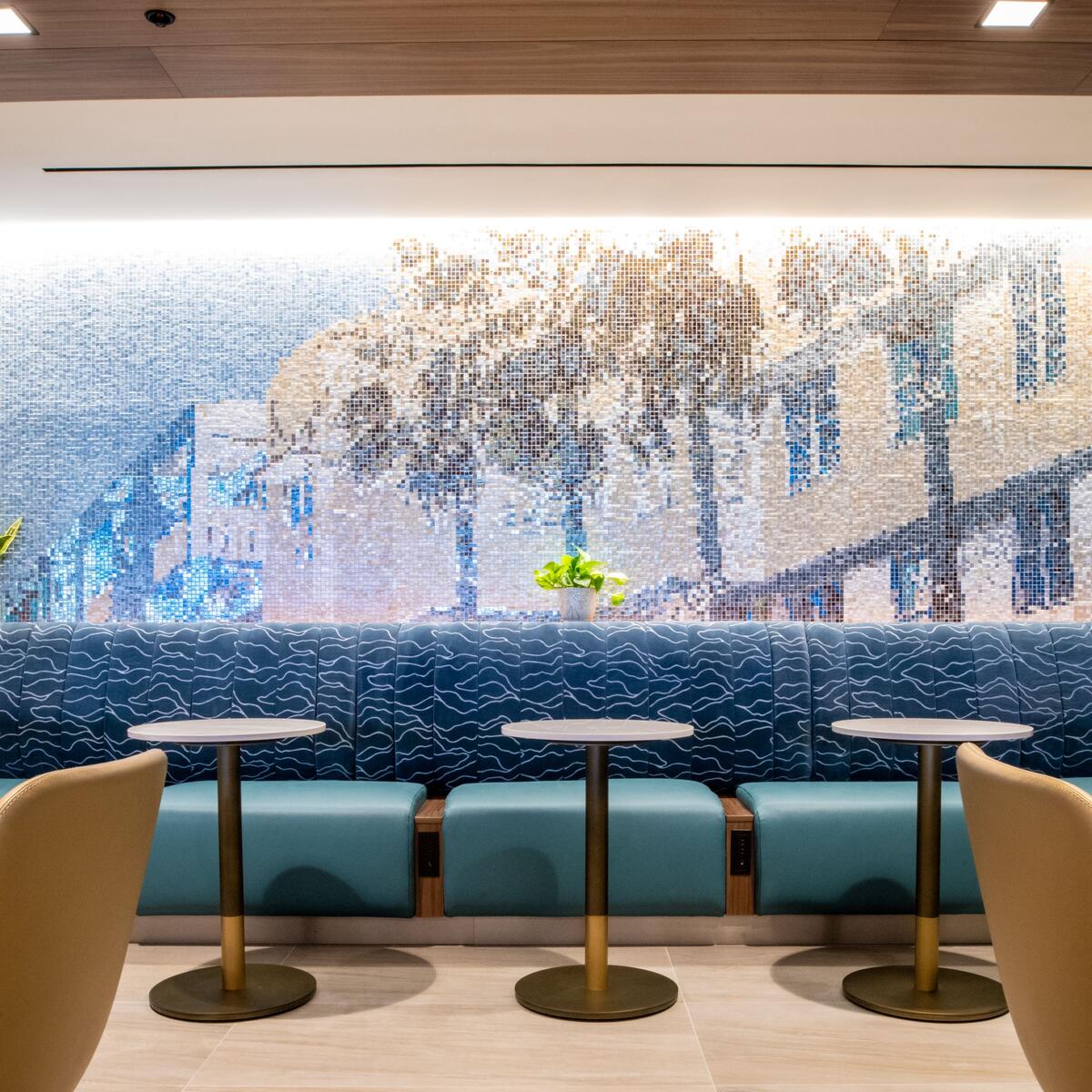 A new mosaic pays homage to the city’s classic Art Deco architecture, while the overall color palette reflects the nearby turquoise waters, blue sky, and white and gold accents seen in south Florida designs. 