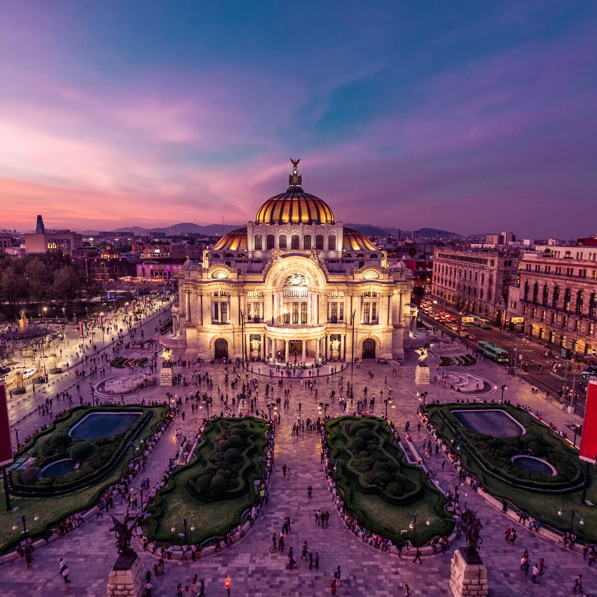 The Palacio de Bellas Artes in Mexico City gleams at twilight.