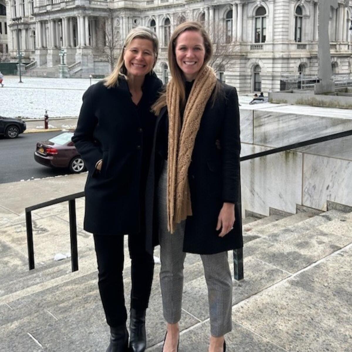 Delta Chief Sustainability Officer Amelia DeLuca (right) with Patricia Ornst, Managing Director - Government Affairs, outside the New York Capitol in Albany.
