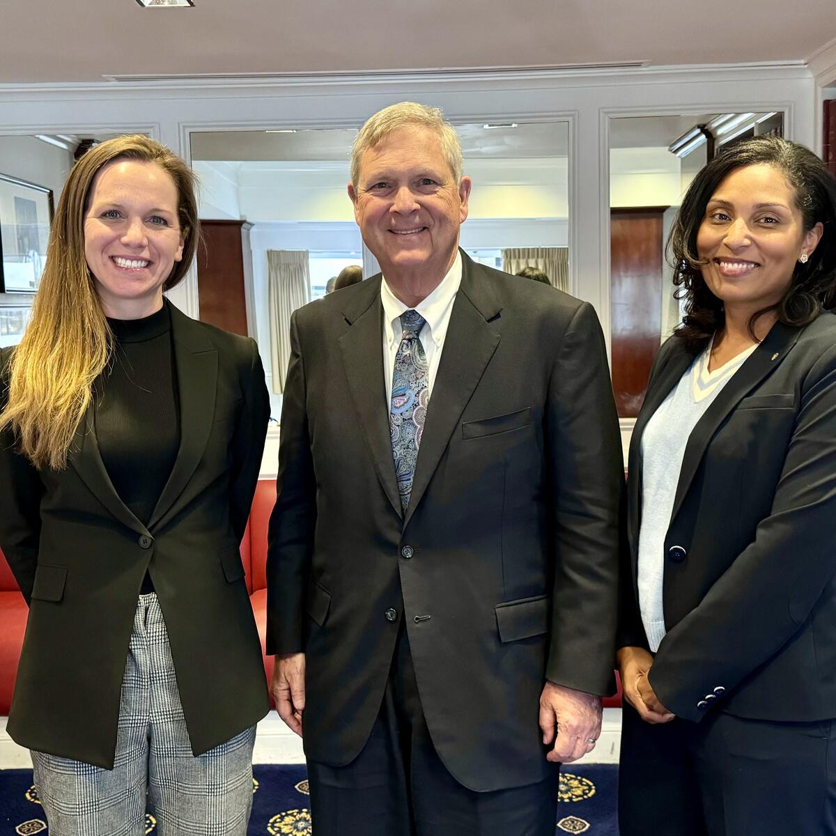 Delta Chief Sustainability Officer Amelia DeLuca and Cherie Wilson, V.P. Government Affairs – Sustainability with U.S. Department of Agriculture Secretary Tom Vilsack