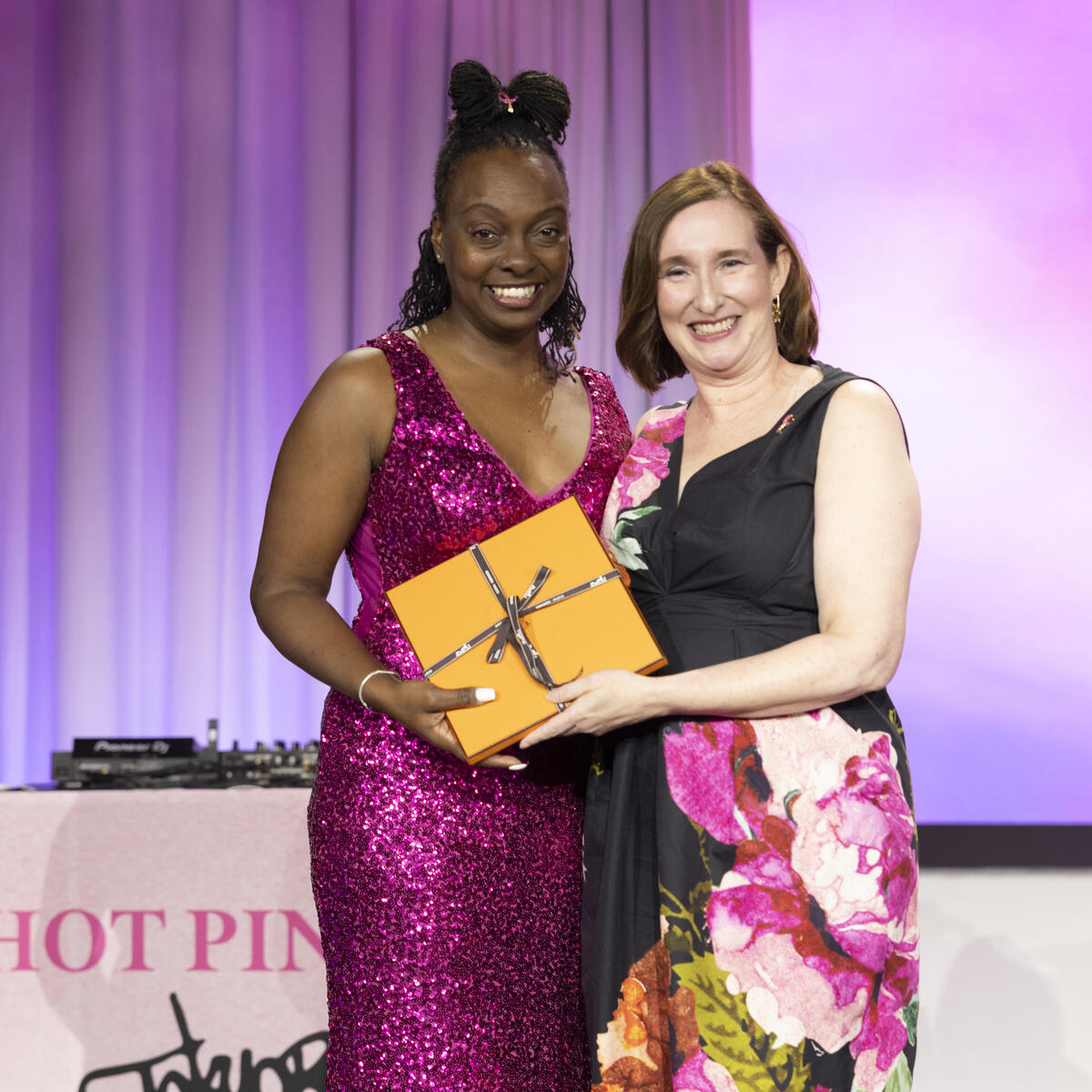 Kristen Manion Taylor, Senior Vice President of In-Flight Service at Delta, honored Delta flight attendant and "survival sister" Marenda Hughes Taylor with the Roslyn and Leslie Goldstein Unsung Hero Award at this year's Breast Cancer Research Foundation Hot Pink Party in New York.