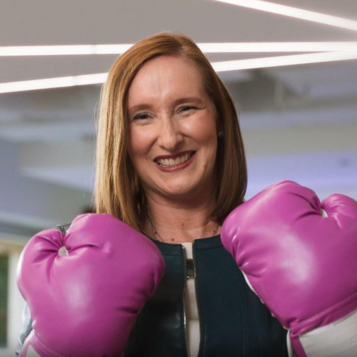 When Kristen Manion Taylor, Senior Vice President of In-Flight Service, announced her breast cancer diagnosis to her “Delta family,” a care package from her “survival sister,” Marenda Hughes Taylor, contained the ultimate memento for the battle ahead: a pair of pink boxing gloves. 