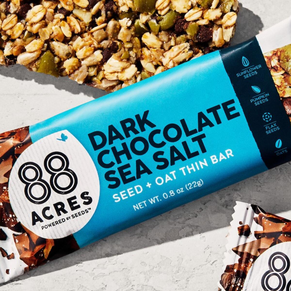 A photo of an on-board Delta snack, a soft-baked 88 Acres Dark Chocolate Sea Salt bar