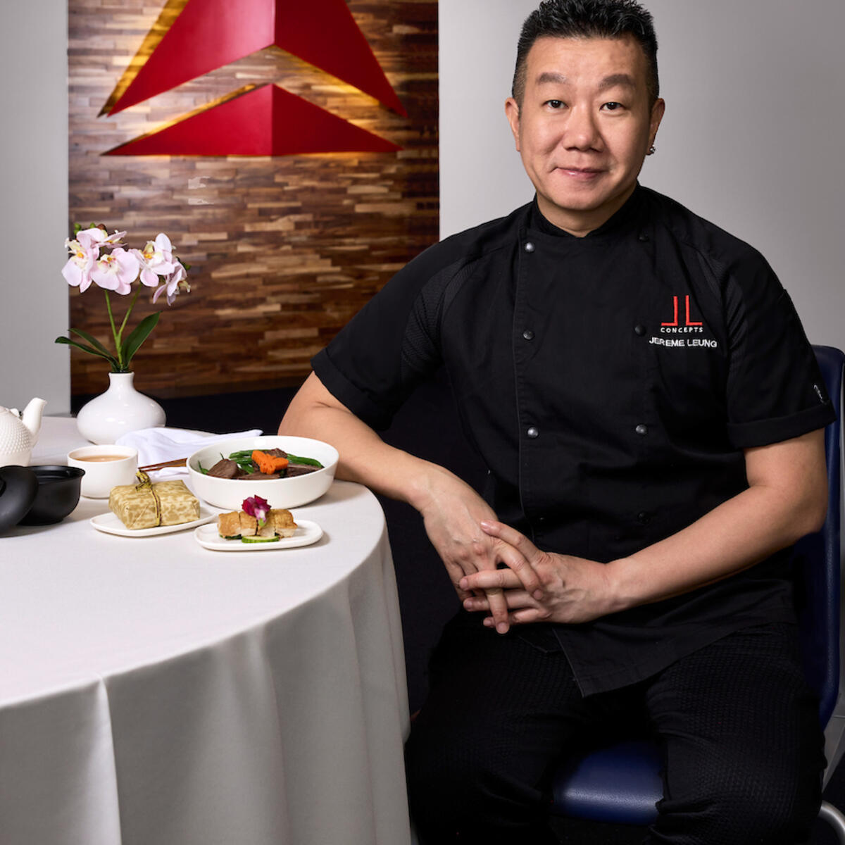 Global restaurateur and pioneering chef Jereme Leung stands in front of the Delta widget.