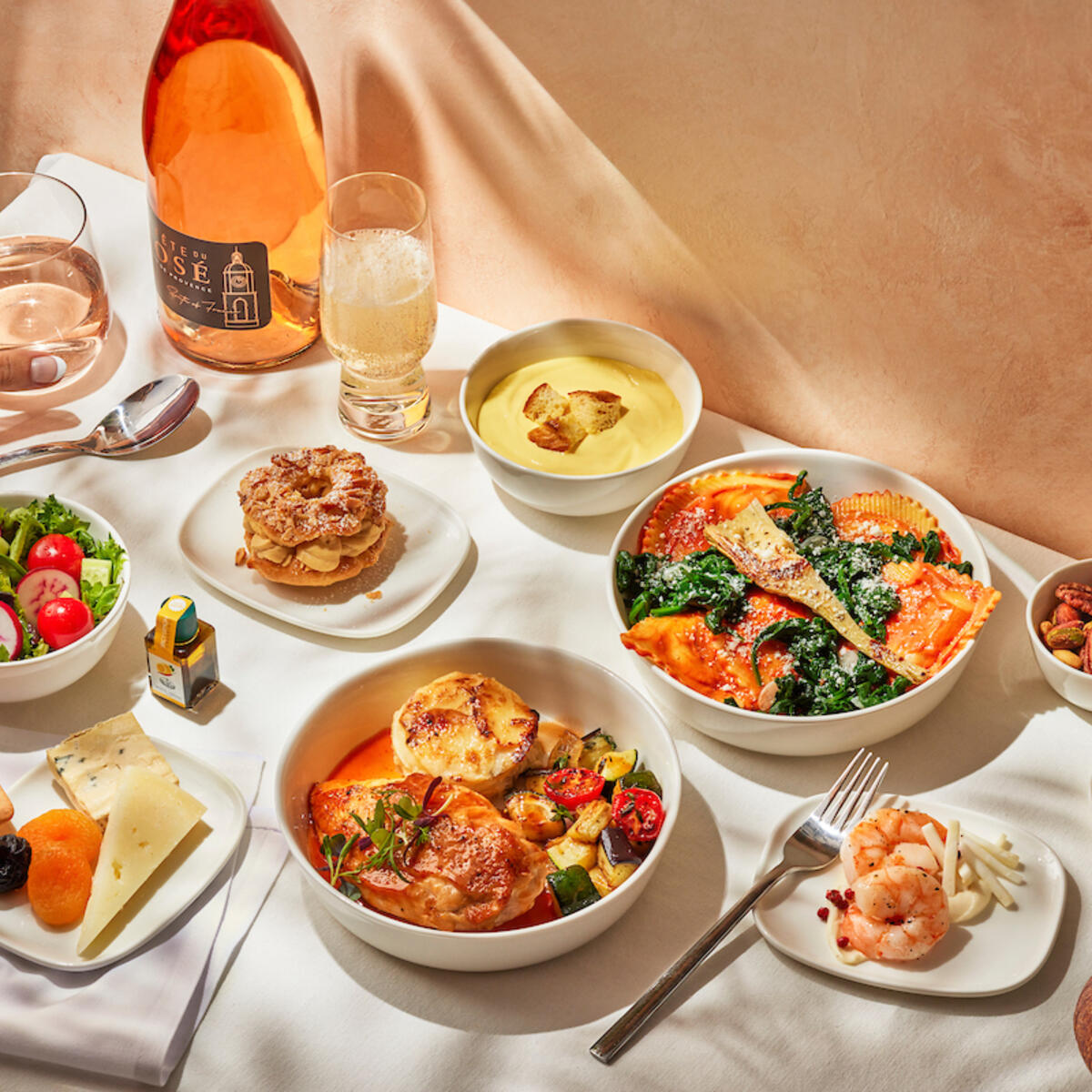 Delta One customers departing from CDG to the U.S. have their choice of roasted chicken breast with chicken jus, artichoke-filled pasta with tomato cream sauce, and more.