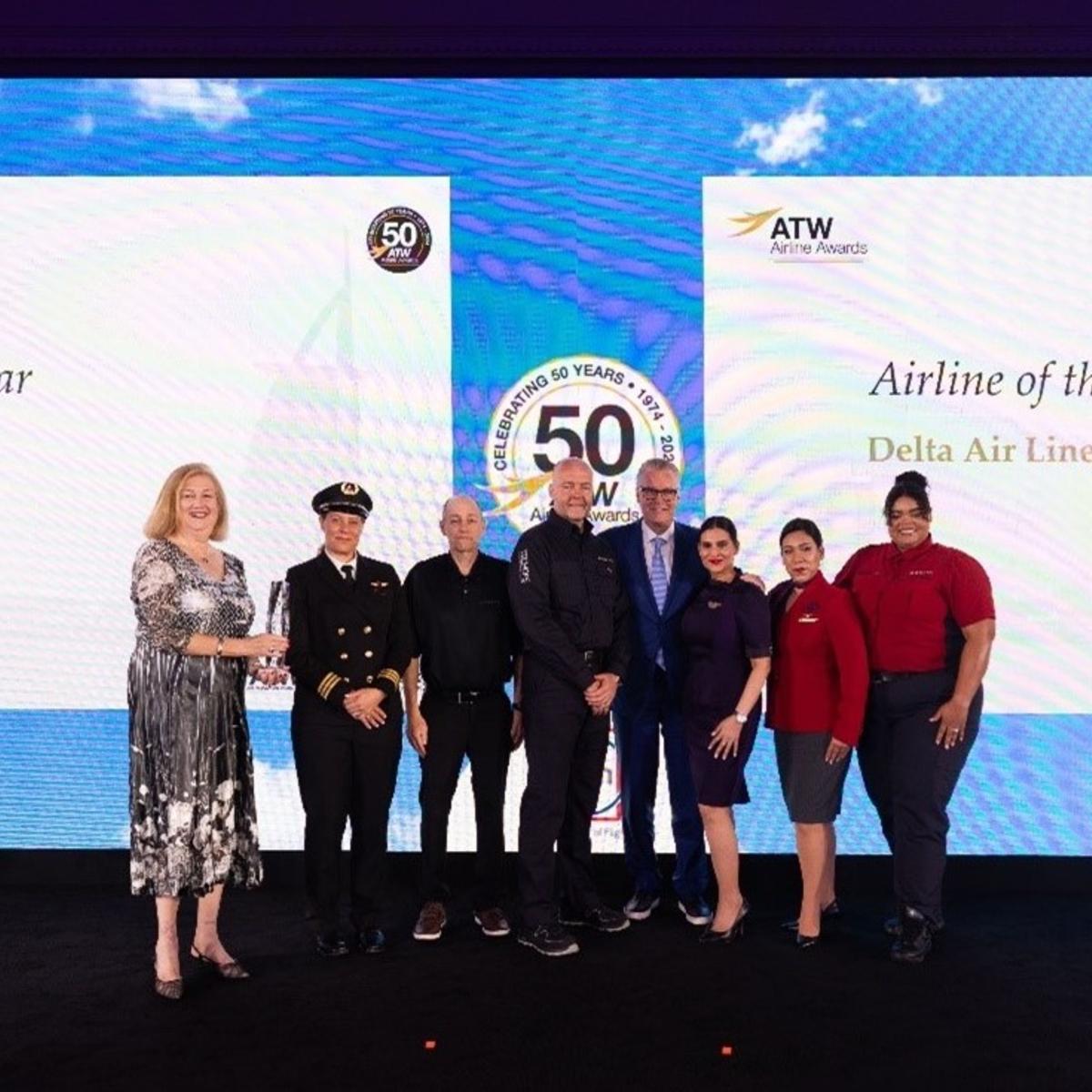 Delta CEO Ed Bastian was joined onstage by six uniformed employees to accept the ATW Airline of the Year Award and Hall of Fame Honor in Dubai on Friday, May 31.