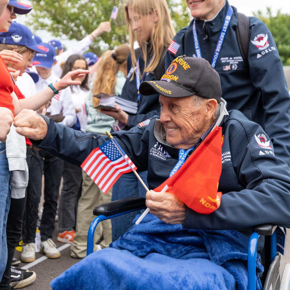 During the program, the WWII veterans participated in a school visit, engaging with 1,200 middle school and high school students by sharing their stories.
