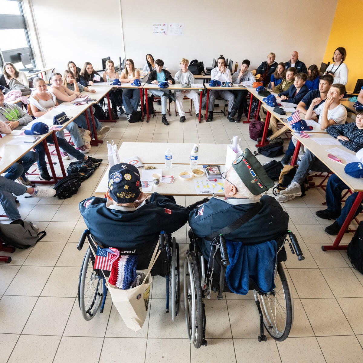 During the program, the WWII veterans participated in a school visit, engaging with 1,200 middle school and high school students by sharing their stories.