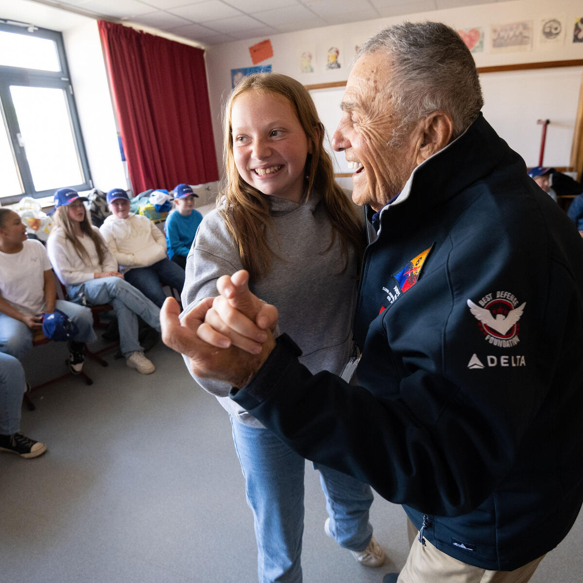 During the program, the WWII veterans participated in a school visit, engaging with 1,200 middle school and high school students by sharing their stories.