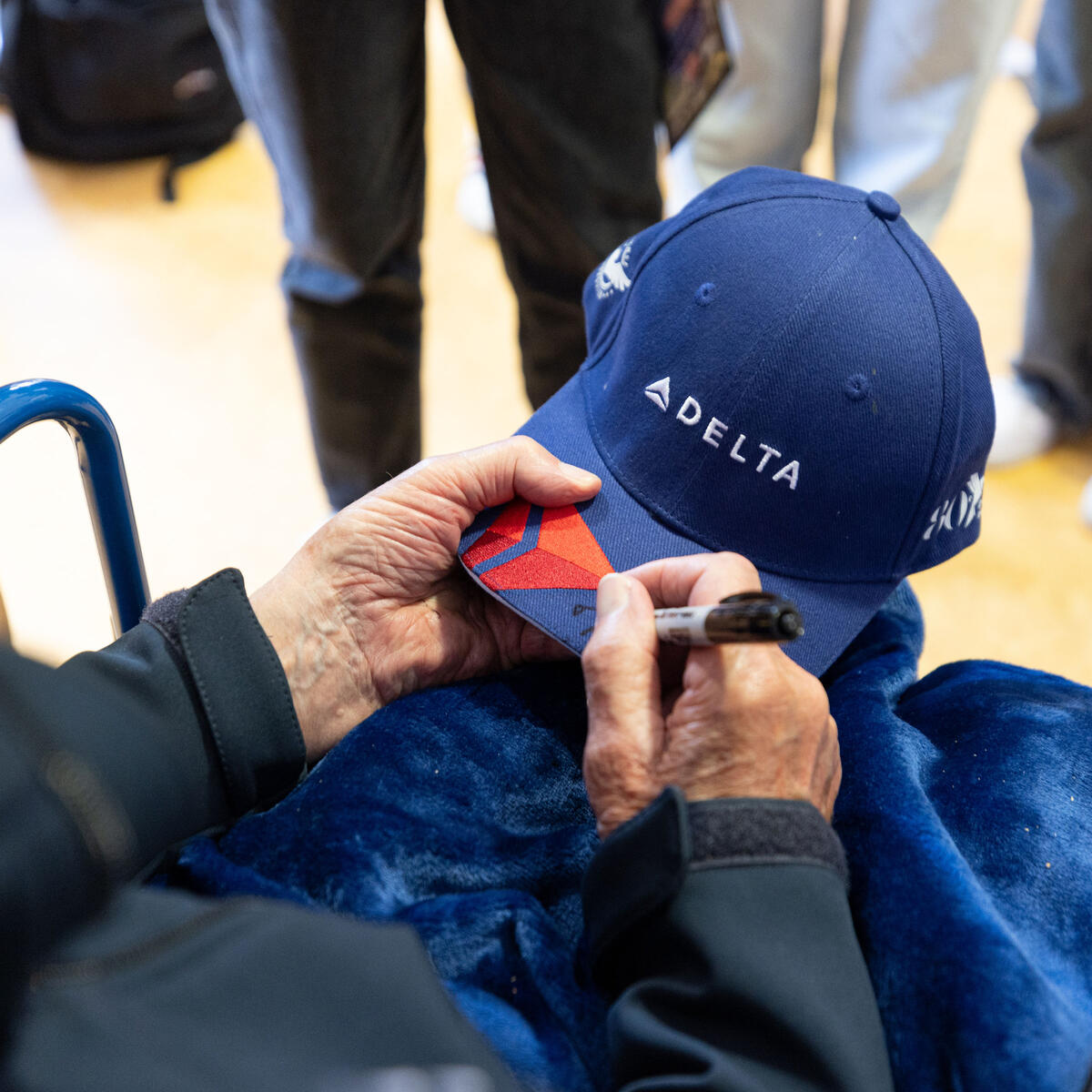 During the program, the WWII veterans participated in a school visit, engaging with 1,200 middle school and high school students by sharing their stories.