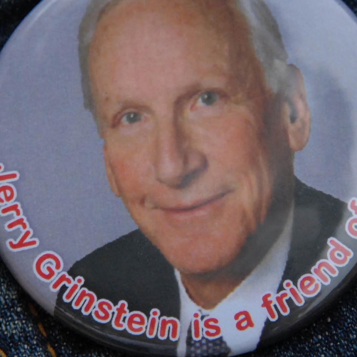 A button featuring former Delta CEO Jerry Grinstein that reads "Jerry Grinstein is a friend of mine."