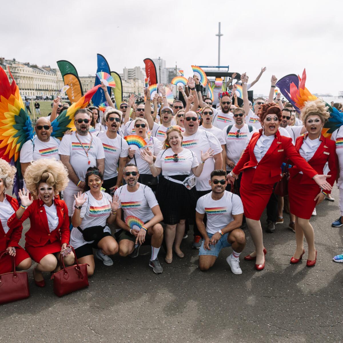 Delta and Virgin Atlantic people pose at the Brighton & Hove Pride parade.