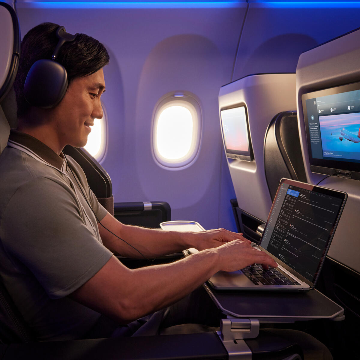 A customer uses their personal device onboard